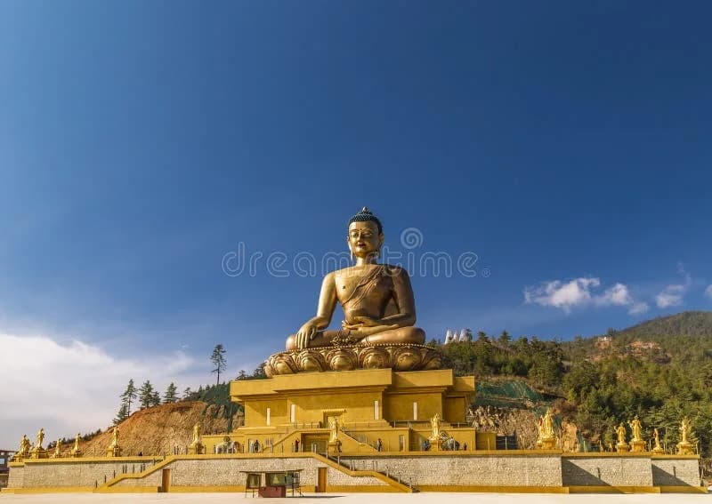 Buddha Dordenma seated against a deep blue autumn sky above the Thimphu valley